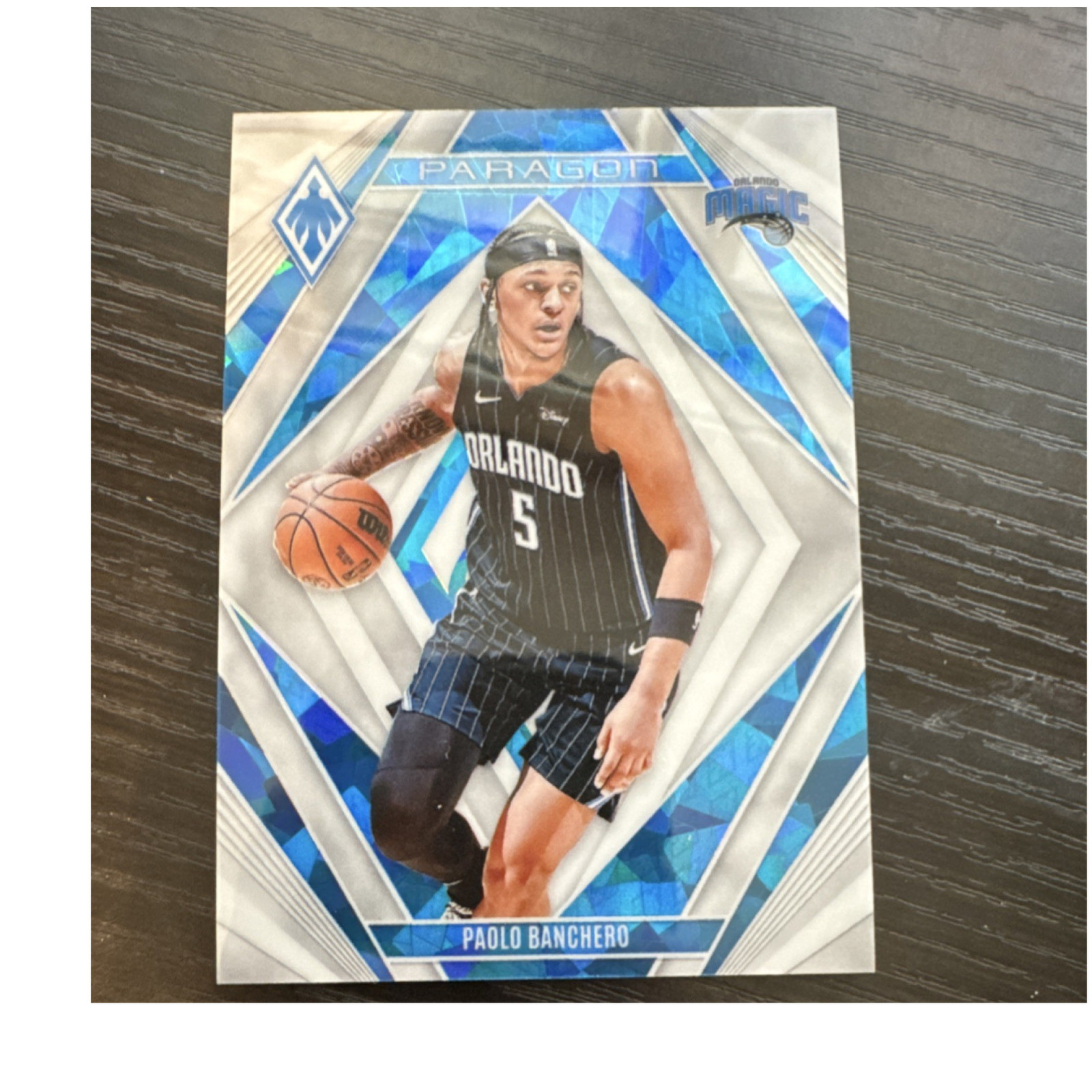 Panini Phoenix 2023-24 Paragon White Ice Paolo Banchero Magic #23 /125