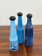 Tris di bottiglie da Liquore degli anni '70 ideate da Salvador Dali