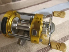 Bass Pro Shop Mega Cast Baitcast reels MCM2000 MCM 2000 -Works Good-Used