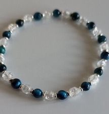 BRACCIALE DONNA IN ACCIAIO CON PERLE SINTETICHE E CUORE
