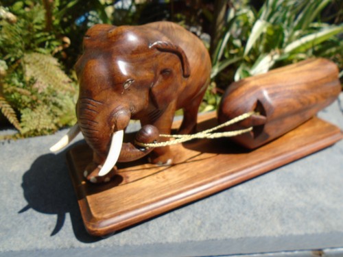 Elephant hardwood sculpture on a stand pulling a log lovely item - Picture 9 of 12
