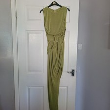 Green cut out bodycon midi dress looks great with heels or flats cut out sides