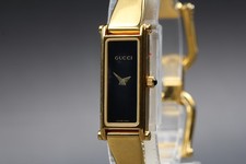Near MINT GUCCI 1500L 13mm Black Dial Gold Band Quartz Women's Watch