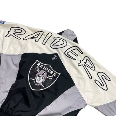 VTG 90s NFL LOS ANGELES RAIDERS PRO PLAYER SPELL OUT WINDBREAKER