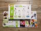 Nintendo Wii Fit Plus Balance Board & 8 Fitness Games Bundle