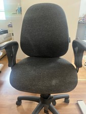 Used ergonomic dark grey chair
