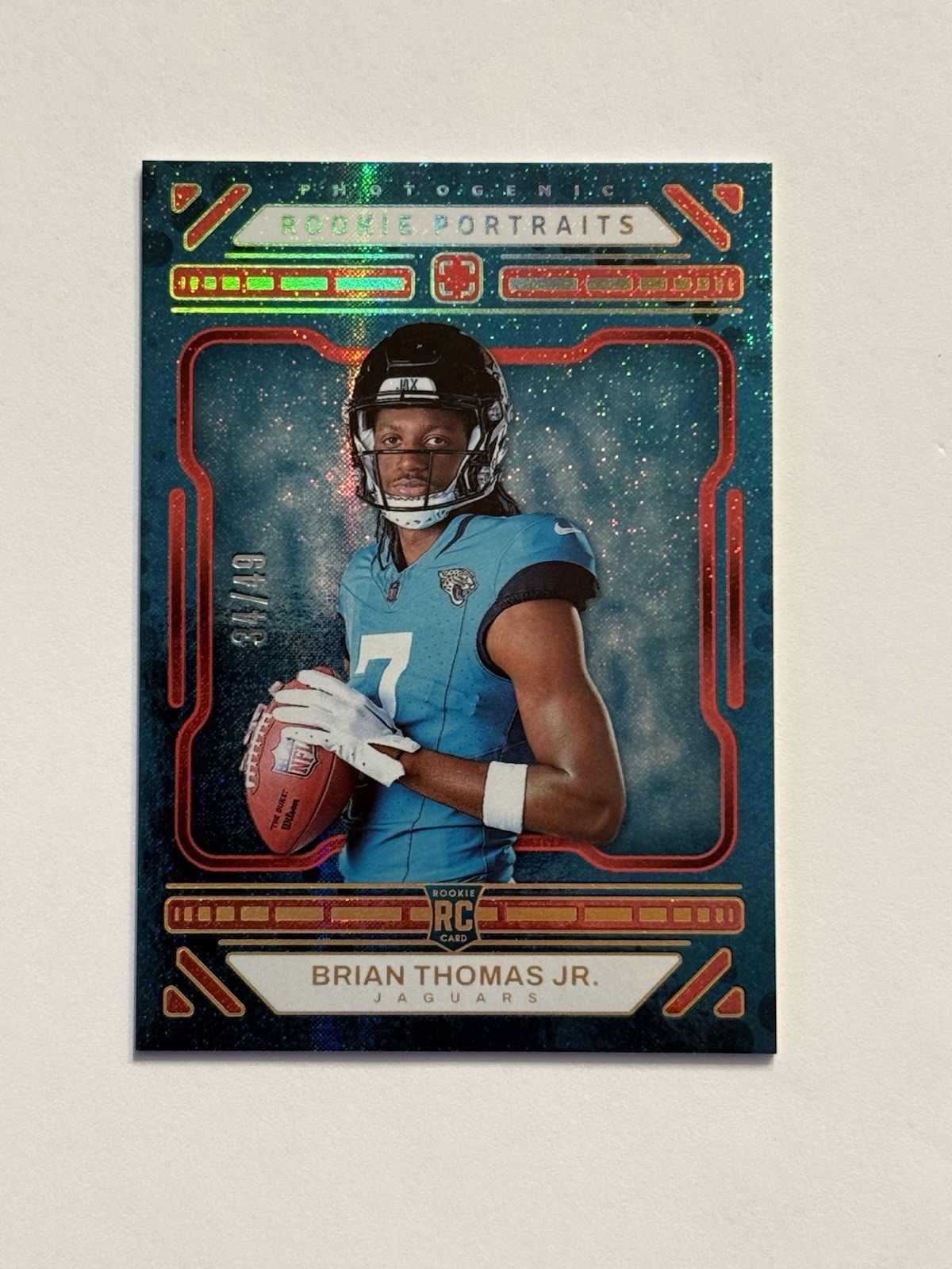 2024 Panini Photogenic Brian Thomas Jr Rookie Portrait Blue /99 SP (Color Match)