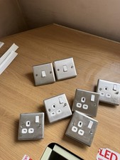 Set Of 5 brushed  Chrome Plug Sockets And 2 Light Switches. Used 