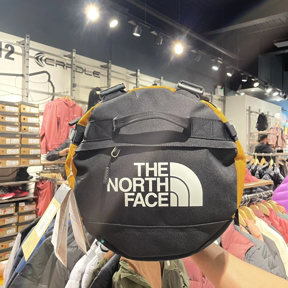 North face duffel store bag small uk