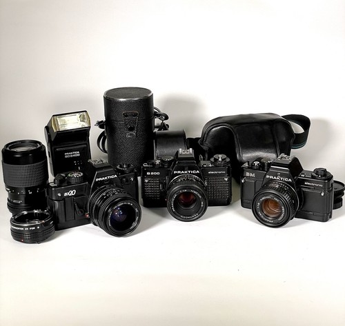 Lotto 3 fotocamere pellicola Praktica BX20 B200 BM + obiettivi flash custodie non testate - Foto 1 di 14