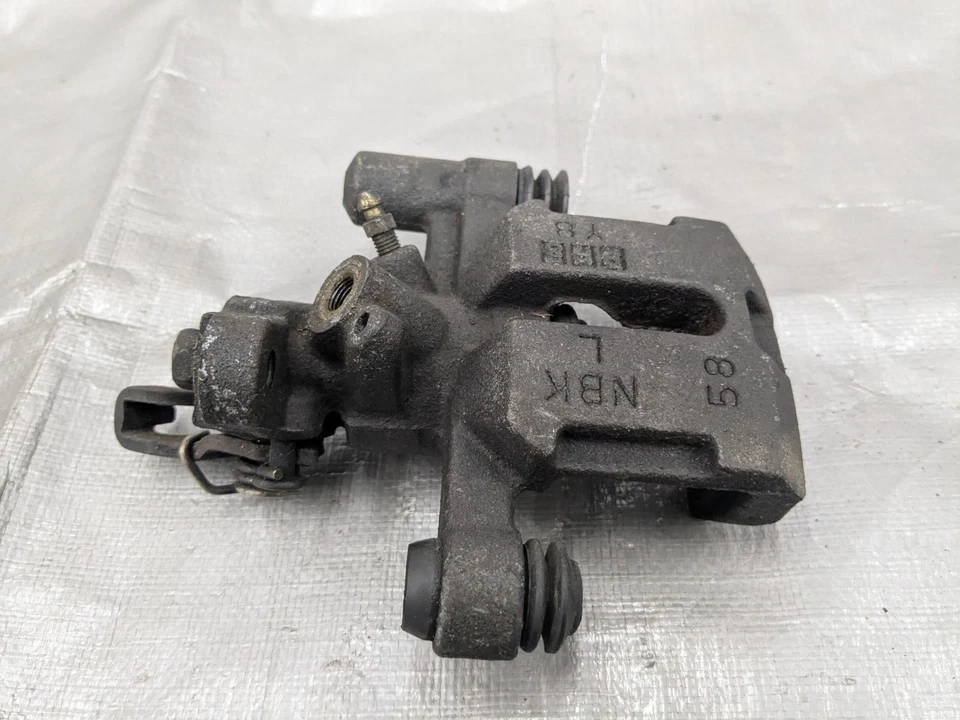 Pinza de freno trasera izquierda Mazda Miata 1994-2000 OEM NA75-26-61Z 94-00 Foto 3 de 4