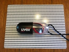 UVEX Glasses Vintage in pill shaped container polarized performance