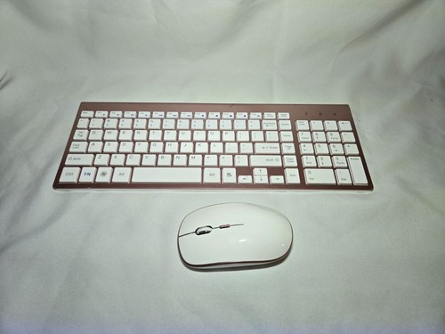 Pink wireless keyboard and mouse combo