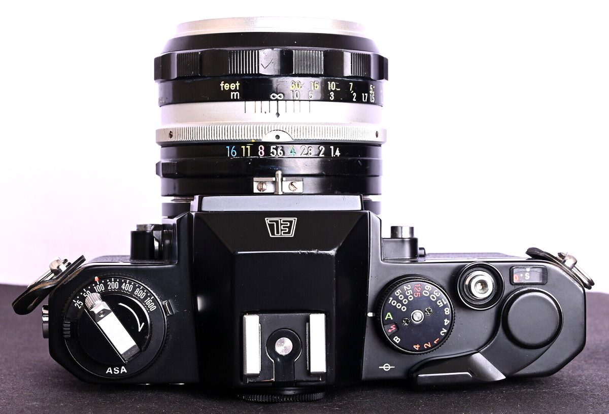 Nikomat EL Black 35mm Film SLR c/w N. K. NIKKOR-S 50mm f/1.4 Lens