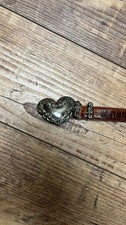 vintage brown croc-embossed leather belt with a silver heart concho buckle