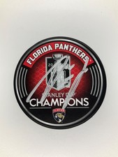 FLORIDA PANTHERS ANTON LUNDELL SIGNED 25’ SC CHAMPIONS PUCK JSA WITNESS COA