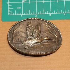 The Great American Buckle Company Chicago Duck in Flight Belt Buckle