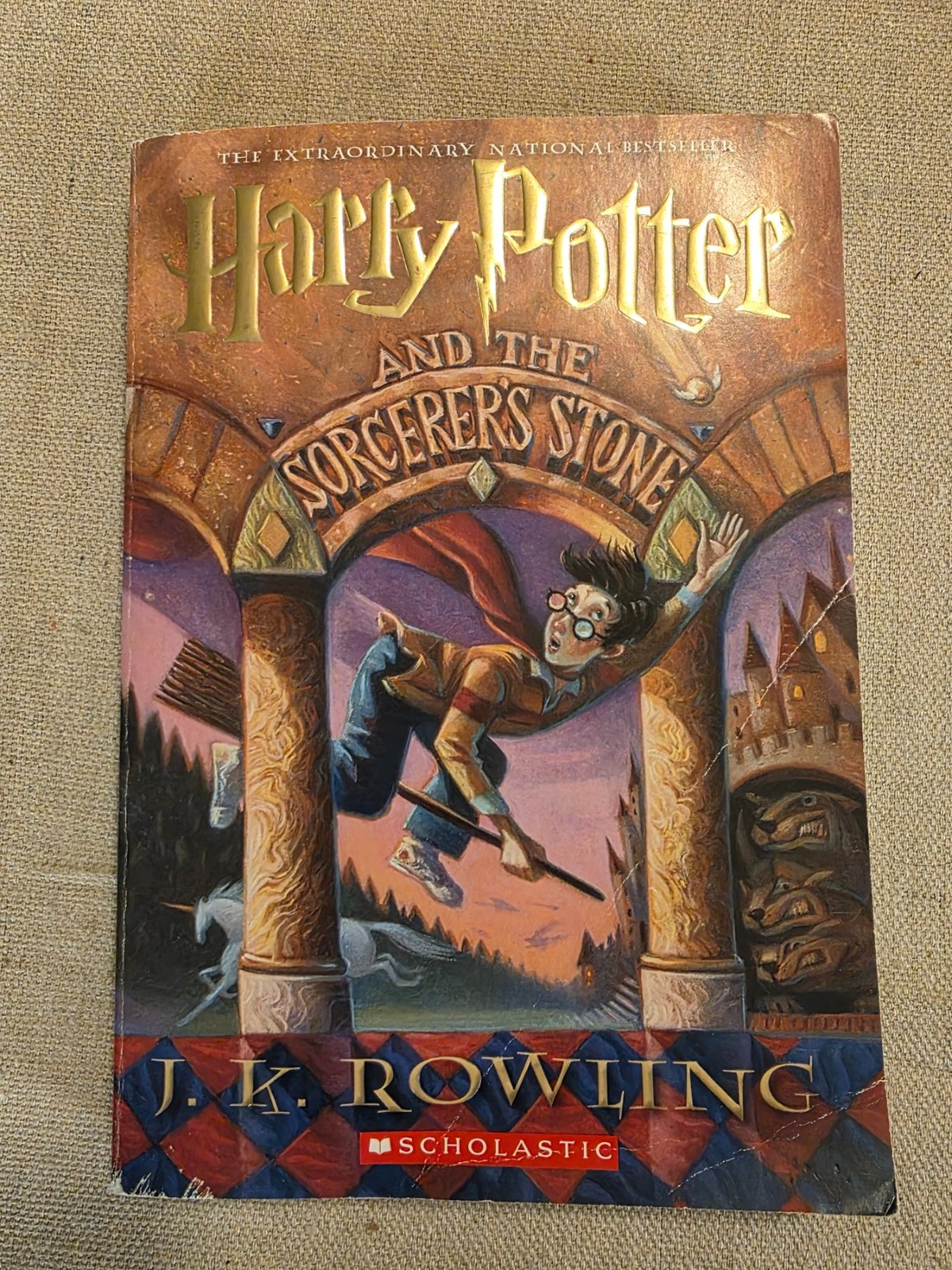 Harry Potter and the Sorcerer's Stone by J.K. Rowling Paperback Scholastic