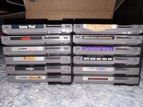 Nintendo NES with 12 games, 2 controllers, game pad, & zapper. Great condition!!