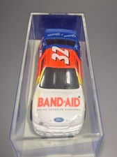 UPC 381370000099 product image for NASCAR Band-Aid Collector's Racing Champions #32 Dale Jarrett 1/64 Car With Case | upcitemdb.com