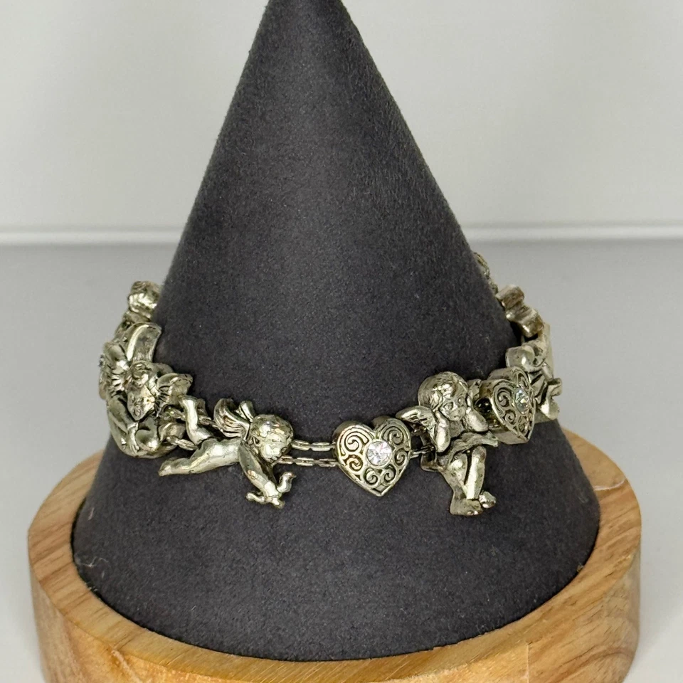 Pulsera de eslabones de ángel querubín Avon corazones diamantes de imitación tono plata Foto 2 de 4