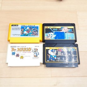 Japanese original Famicom in box with 8 games Family Computer HVC-001 1983 CIB