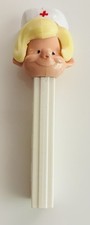 Vintage BLONDE NURSE - PEZ Dispenser - No Feet US Pat 3.8 White Base USA