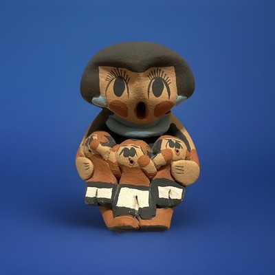 Native American Pottery Known As The Storyteller. Signed. By Artist Carol Sando.