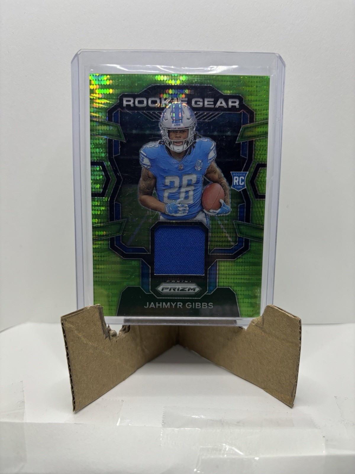 2023 Panini Prizm - Rookie Gear Jahmyr Gibbs #RG-JG Neon Green Pulsar Prizm t3