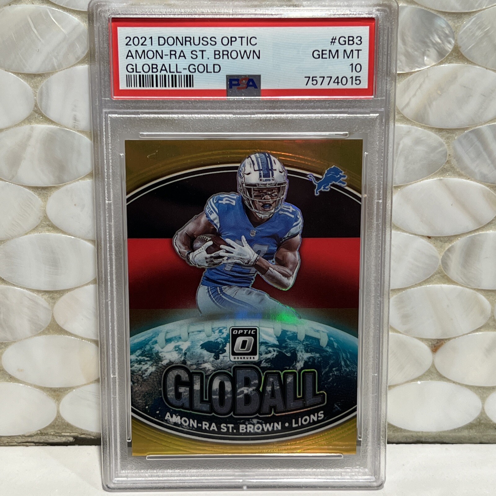 Amon-Ra St. Brown Panini Donruss Optic Globall #GB3 Gold