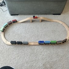 Large Wooden train set with 13 trains and 52 track pieces