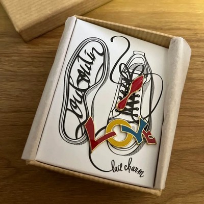 Christian Louboutin Sneaker Lace Charms shoe Accessory LOVE Novelty MINT UNUSED