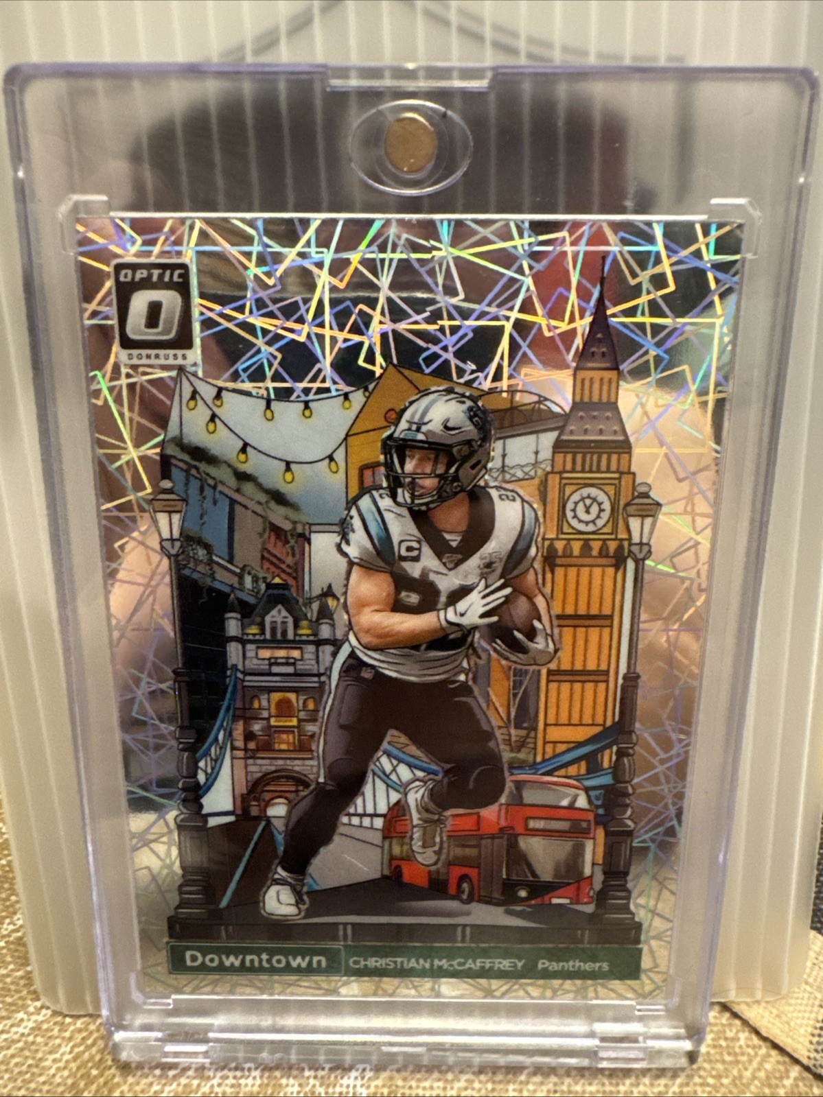 2023 Panini Donruss Optic - International Downtown Christian McCaffrey #9