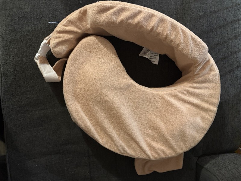 Light pink breast feeding pillow, barely used. My breast friend brand