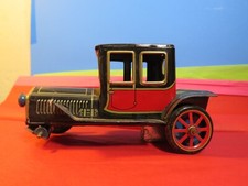 Vintage Tin Toy Friction Old Timer's Car, Red  Black, AS IS missing one wheel.