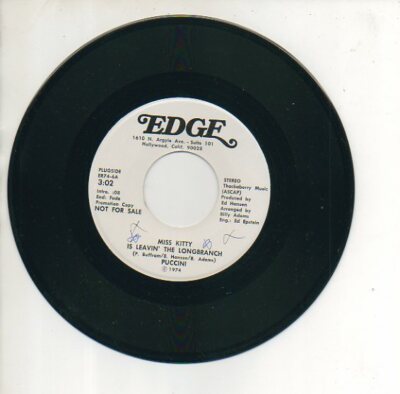 PUCCINI 45 RPM MISS KITTY IS LEAVIN' THE LONGBRANCH / MAGNIFICENT SANCTUARY BAND
