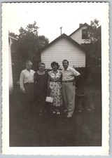 Vtg B&W Snapshot Four People Couples Standing Yard House Lawn Vintage 1950s