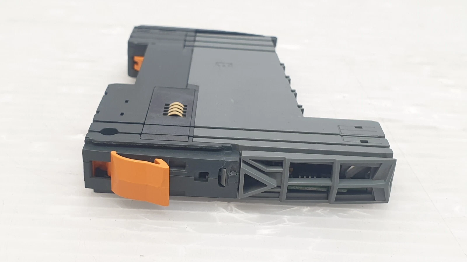 End view of the X20BM11 bus module with orange lever and contacts