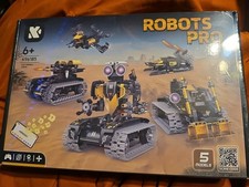 Robots Pro Set. Model K96185. 5 Different Machines. Scan The Tag For More Info.