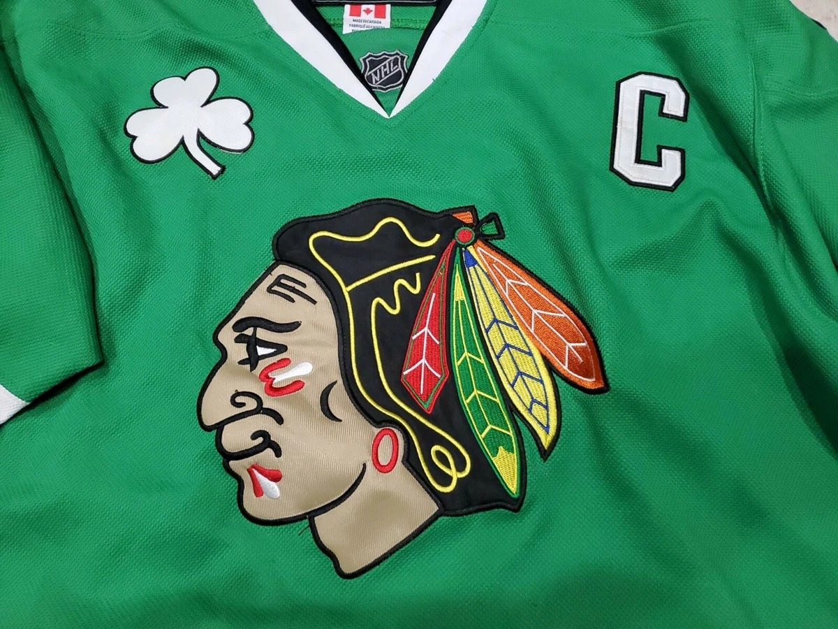 Toews top green jersey