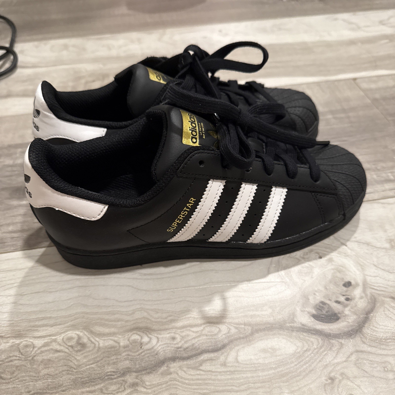 Black Adidas Superstar size 5/5.5