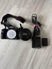 PENTAX K-70 Digital SLR Camera with TAMRON 18-200mm Lens Battery Charger