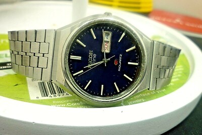 ︎ RICOH silver RIQURTZ RARE Vintage Silver-tone Ricoh Watch | Day