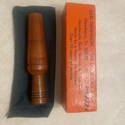 Original Earl Dennison duck call with box, never carried or used.