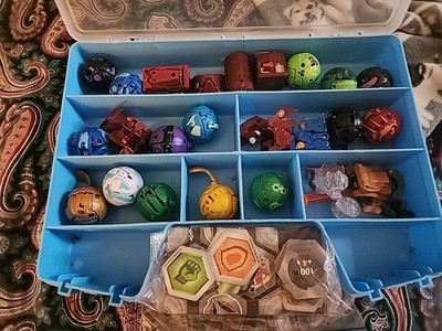 Bakugan lot 22 With Case And Some Other Misc. Pieces.