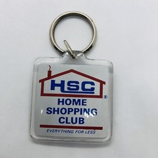 Llavero acrílico publicitario HSC Home Shopping Club - todo por menos