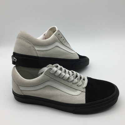 black and white sole vans