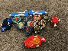 9 Bayblades 2 grips 3 string Launchers    