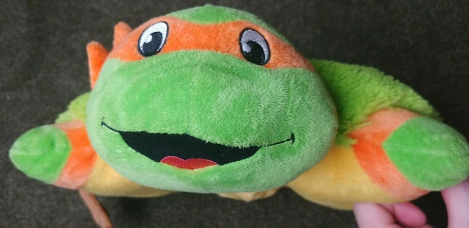 Almohada Mascotas Dream Lites Teenage Mutant Ninja Turtles - Miguel Ángel se ilumina Foto 2 de 4