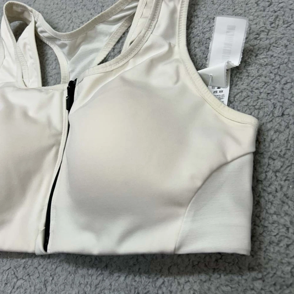 Sujetador deportivo grande Nike Dri Fit soporte alto forma sujetador deletreado Foto 4 de 4